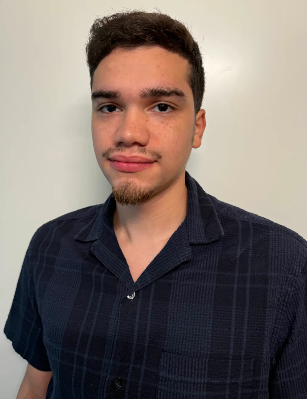 Kristian Torres (he/him)